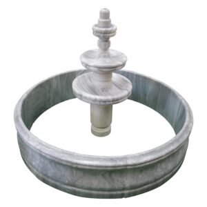 Stone water fountain with surround